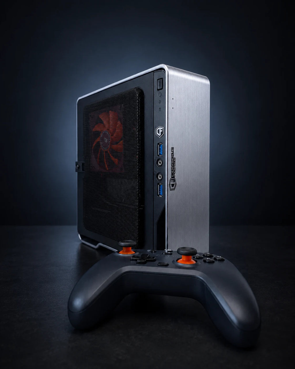 Console Forge Mini next to a game controller for size comparison